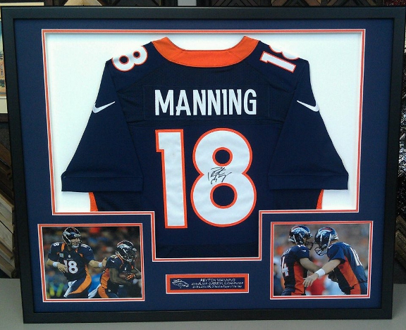 Signed Peyton Manning Jersey in a Frame